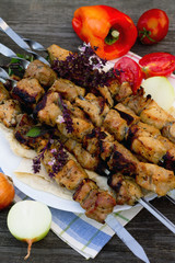 Pork to find Fresh vegetables on a dark gray background