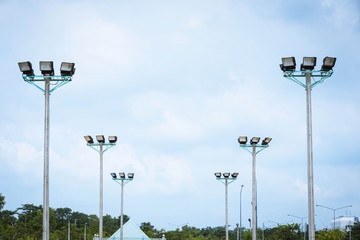 Close-up spotlight of stadium on the sky.