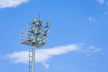 Close-up spotlight of stadium on the sky.