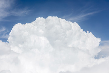 Naklejka na ściany i meble Close-up big fluffy clouds in light blue sky, beautiful cloudsca
