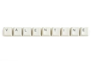 valentine from scattered keyboard keys on white