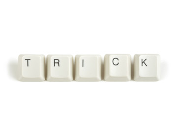 trick from scattered keyboard keys on white