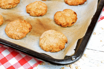 Homemade cookies on baking sheet close up