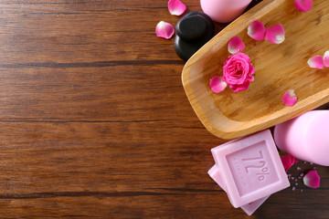 Beautiful composition of spa treatment on wooden table