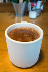 Pure hot chocolate in a white mug