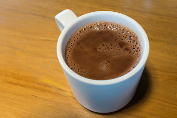 Pure hot chocolate in a white mug