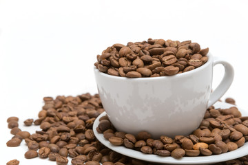 Coffee beans in coffee cup isolated on white