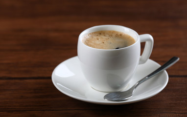 Cup of coffee on table close up