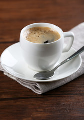 Cup of coffee on table close up
