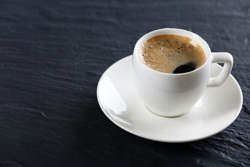 Cup of coffee on table close up