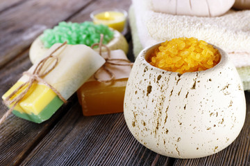 Beautiful spa composition with sea salt on table close up