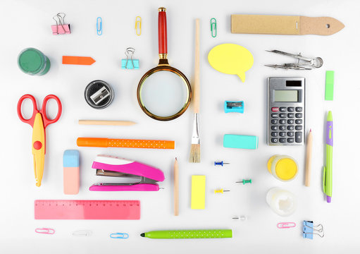 Bright stationery objects on table close up
