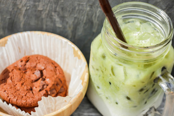 Iced green tea latte and chocolate cookies