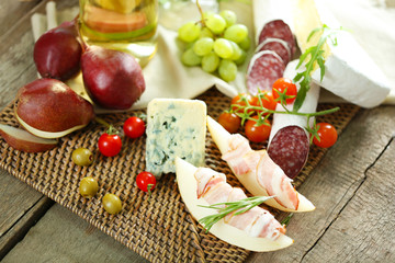 Still life with various types of Italian food and wine