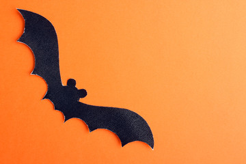 Halloween, bat on orange background