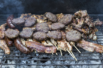 Various meats like chicken, sausage, steak and corn wrapped in a © ververidis