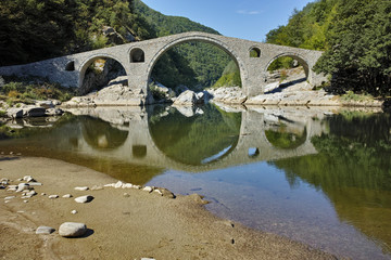 Fototapeta na wymiar Amazing view of Devil's Bridge near Ardino town, Kardzhali Region, Bulgaria