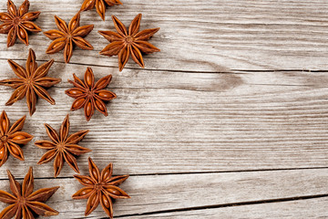 group of star anise over wooden table