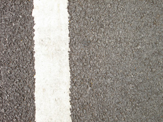 asphalt texture with white dashed line