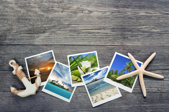 seaside snapshots, anchor and starfish on wooden background