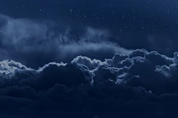 Tuinposter Bewolkte nachtelijke hemel © Zacarias da Mata
