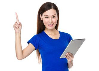 Woman use of the tablet pc and finger point up