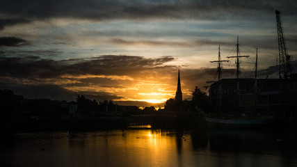 Fototapeta na wymiar ENGLAND, BRISTOL - 13 SEP 2015: Sunrise in Bristol, harbour