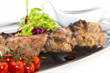 kebab meat sauce and salad vegetables