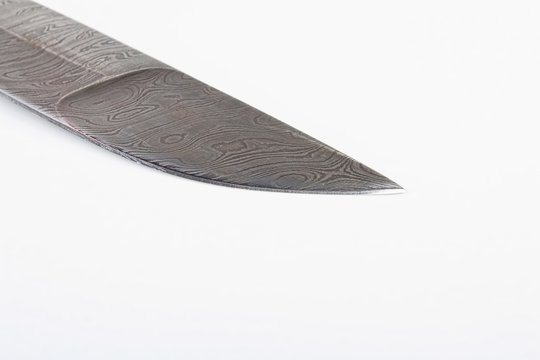 Hunting Knife Damask Steel. Stock Image Macro.
