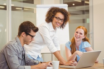 Businesswomen with male colleague