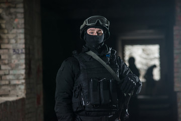 Fully equipped military men with automatic weapons playing