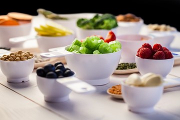 Portion cups of healthy ingredients © WavebreakmediaMicro