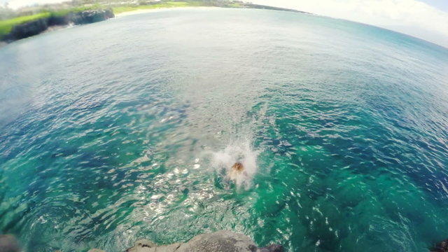 Slow Motion Attractive Young Woman Back Flip Cliff Jump in Bikini into Ocean. Summer Fun Lifestyle. 