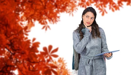 Composite image of pensive model wearing winter clothes