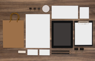 Mock-up business template with shopping bag and tablet.