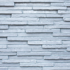 close up of grey unusual brick wall - textured background