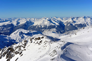 Fototapeta na wymiar Ski slopes and mountain landscape