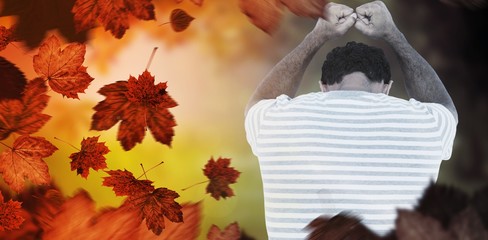 Composite image of upset man leaning on white background