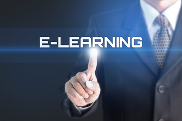 A Businessman holding a white sign with the message E-learning. Can bring to the medium of your ad.