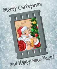 Selfie of merry and slightly drunk Santa Claus with glass of beer in hand. Frame of film on frosty background with greetings