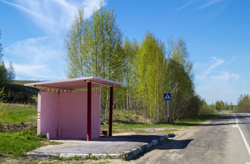 Bus stop on background blue sky