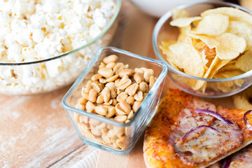 close up of fast food snacks on wooden table