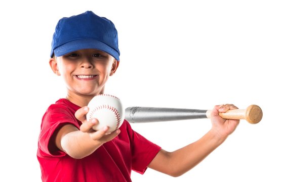 Blonde kid playing baseball