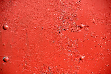 Rusty iron wall covered with paint