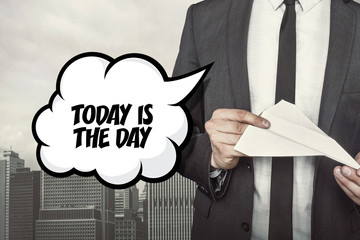 Today is the day text on speech bubble with businessman holding