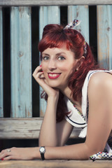 Plakat pinup young woman in vintage style clothing