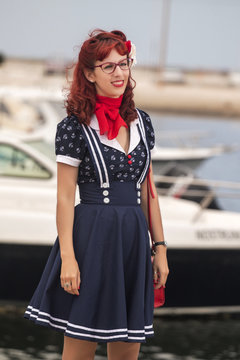 pinup young woman in vintage style clothing