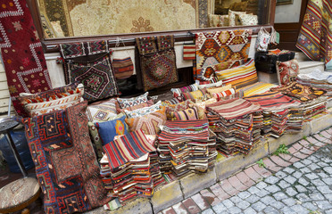 Traditional cushions and carpets in street of Istanbul,Turkey.