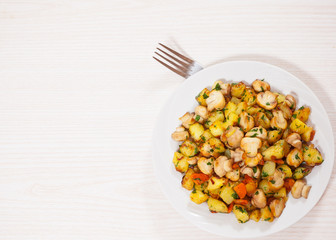 Fried potato with mushrooms