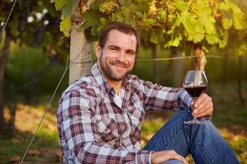 Winemaker with a glass of red wine